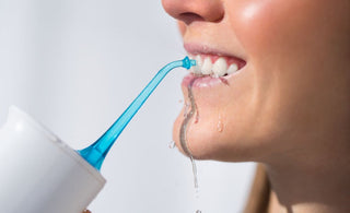What is an oral irrigator?