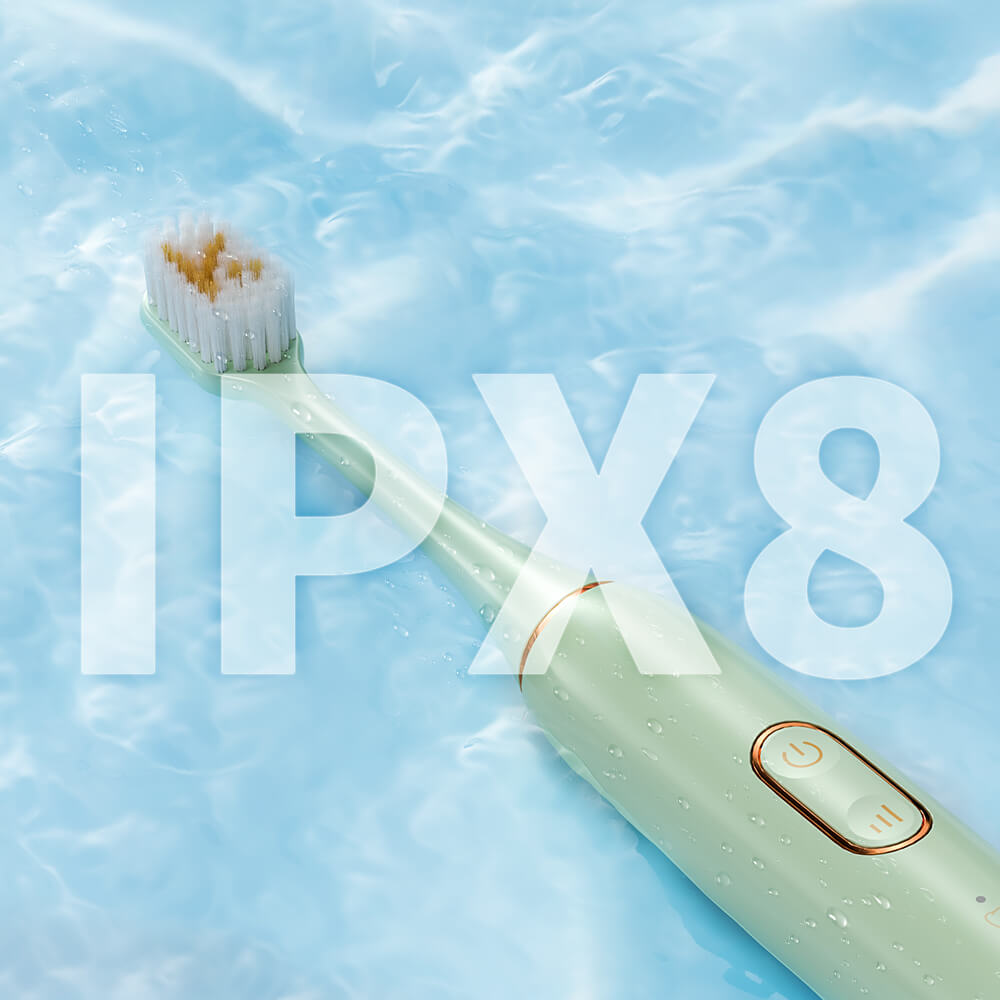 IPX8 waterproof green electric toothbrush