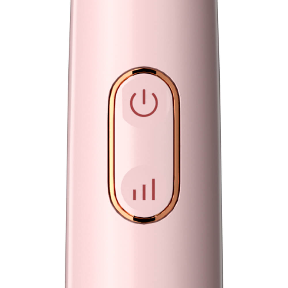 pink electric toothbrush with 2 minute timer